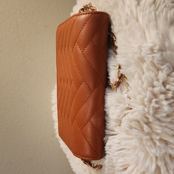 Bebe quilted bag with Gold rope chain cross body bag. Gently Used - Picture 5 of 16